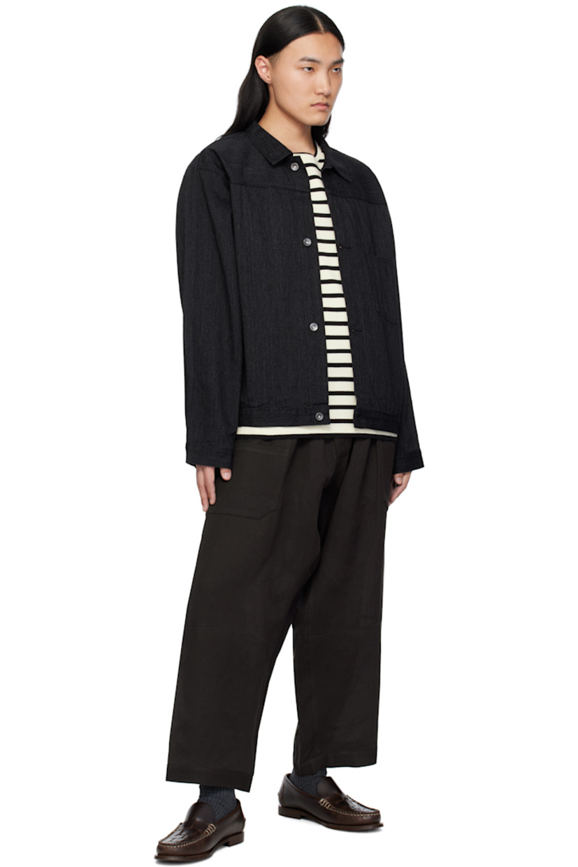 Relaxed-fit rope-dyed non-stretch slub denim jacket. Lightweight, durable, and quick-drying.

· Spread collar
· Button closure
· Patch pocket at chest
· Yoke sleeves
· Single-button barrel cuffs
· Twin pleats at back hem
· Zip pocket at interior

Supplier color: Black