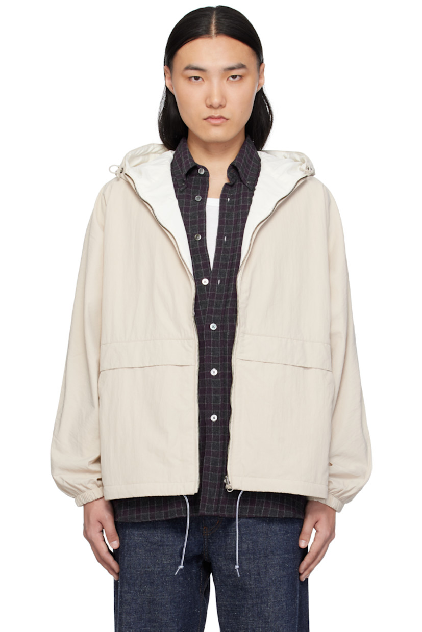 Reversible oversized crinkled nylon taffeta jacket. Water-repellent.

Reverse in off-white polyester jersey. Quick-drying.

· Bungee-style drawstring at hood
· Zip closure
· Text printed at chest
· Welt pockets
· Drawstring at hem
· Dropped shoulders
· Logo patch at elasticized cuffs
· Text patch at back collar
· Patch pockets at interior

Supplier color: Sand beige