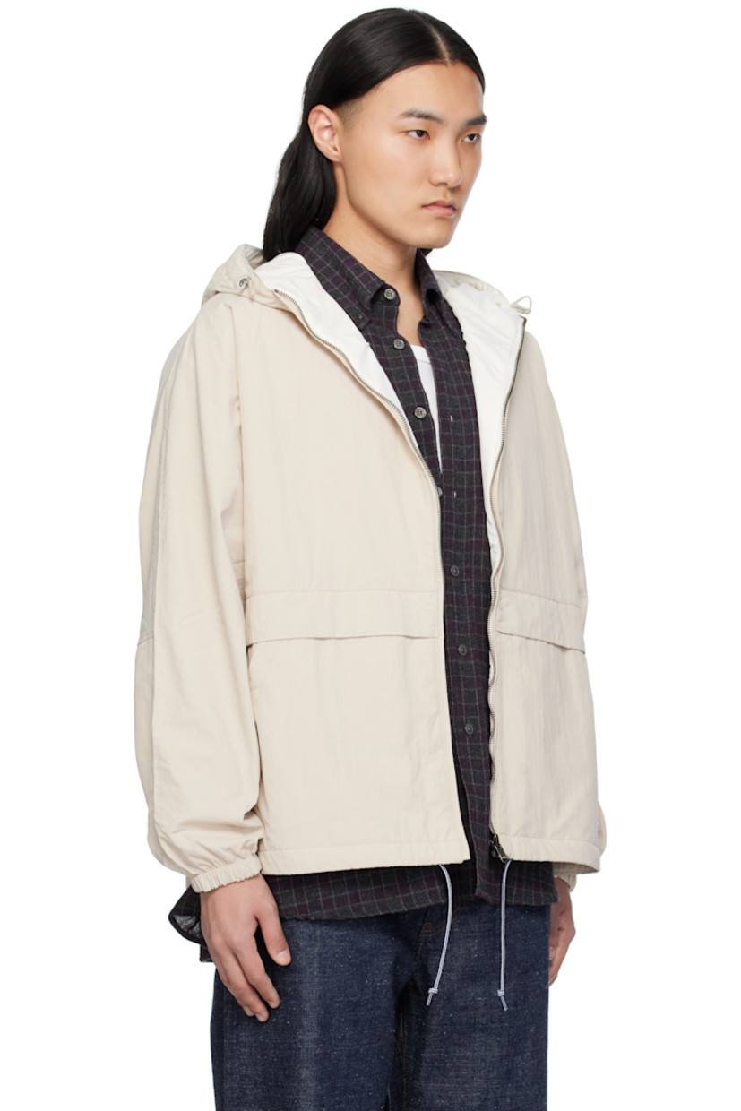 Reversible oversized crinkled nylon taffeta jacket. Water-repellent.

Reverse in off-white polyester jersey. Quick-drying.

· Bungee-style drawstring at hood
· Zip closure
· Text printed at chest
· Welt pockets
· Drawstring at hem
· Dropped shoulders
· Logo patch at elasticized cuffs
· Text patch at back collar
· Patch pockets at interior

Supplier color: Sand beige