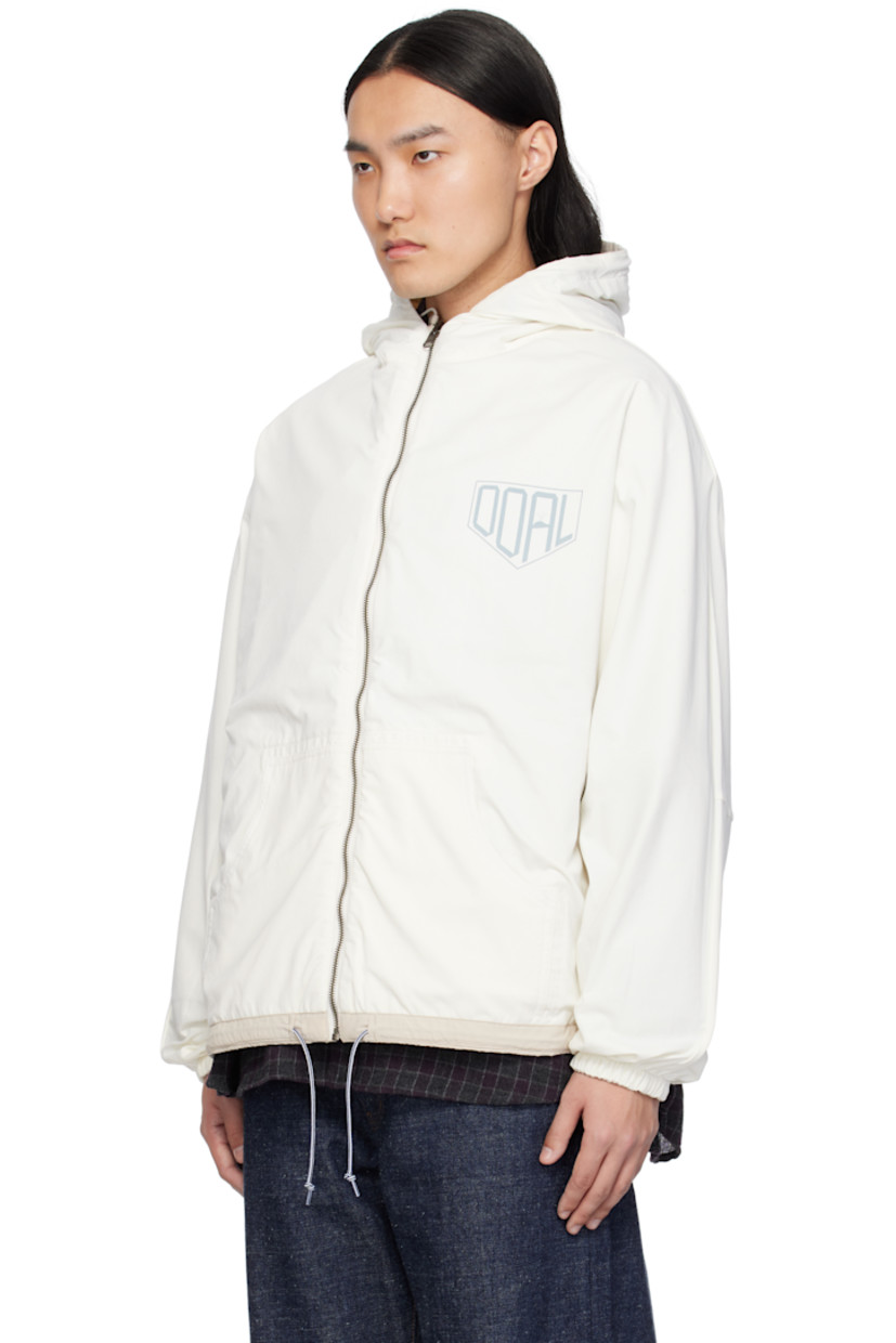 Reversible oversized crinkled nylon taffeta jacket. Water-repellent.

Reverse in off-white polyester jersey. Quick-drying.

· Bungee-style drawstring at hood
· Zip closure
· Text printed at chest
· Welt pockets
· Drawstring at hem
· Dropped shoulders
· Logo patch at elasticized cuffs
· Text patch at back collar
· Patch pockets at interior

Supplier color: Sand beige