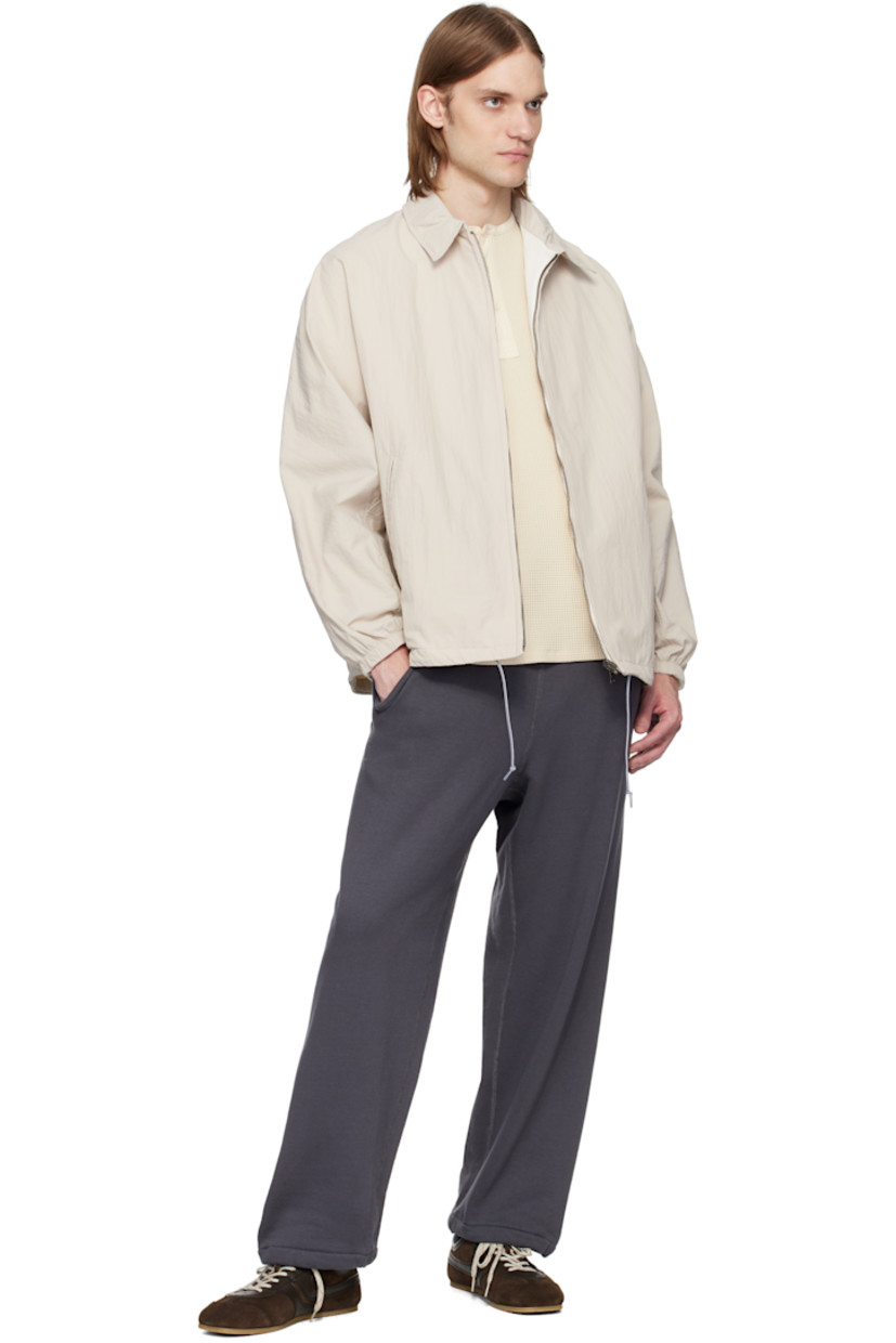 Reversible French terry sweatpants. Overlock stitching throughout. 

Reverse in gray French terry. 

· Drawstring at elasticized waistband
· Three-pocket styling
· Bungee-style drawstring at cuffs

Part of the ONE OCEAN, ALL LANDS capsule.

Supplier color: Charcoal gray