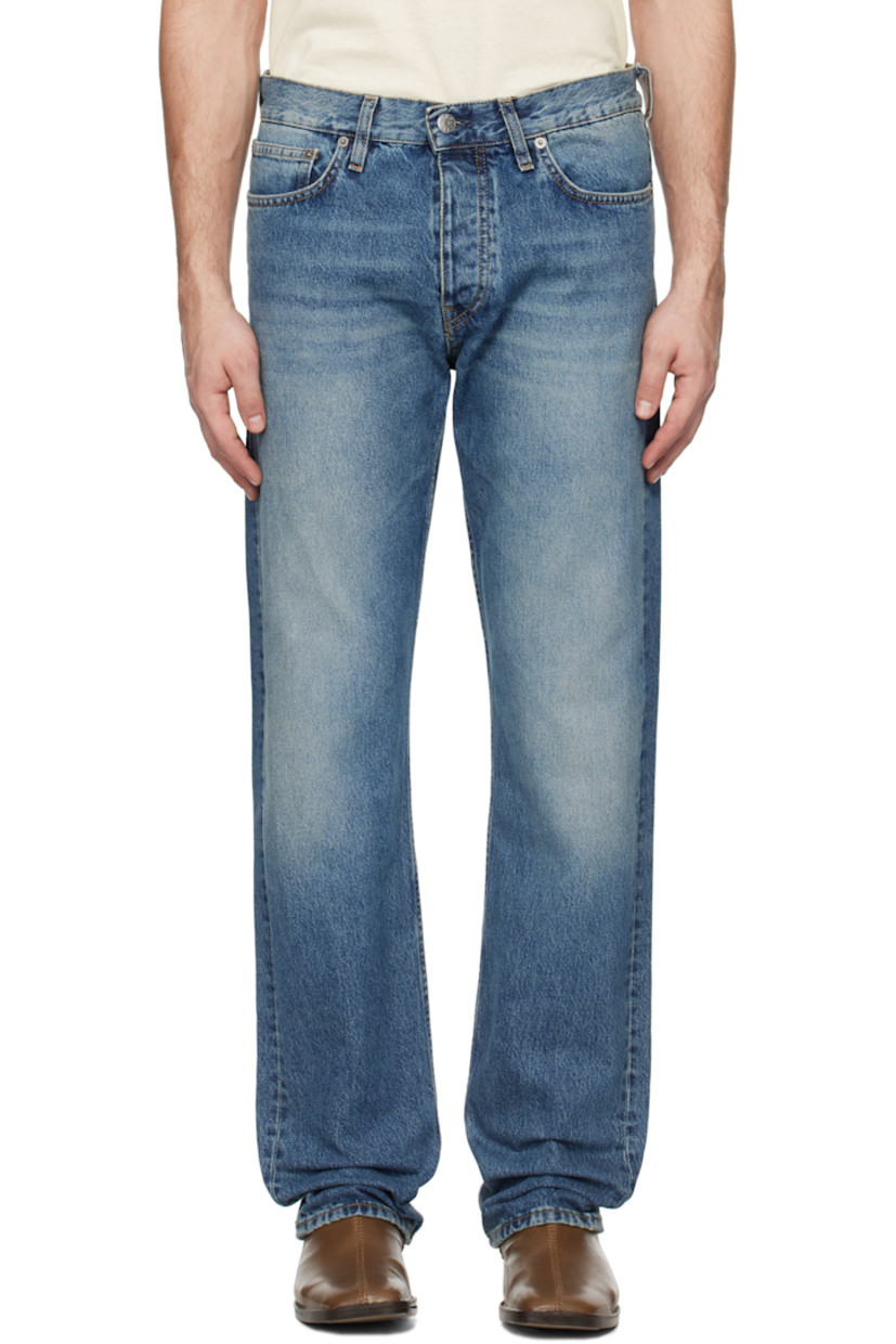 Loose-fit non-stretch organic cotton denim jeans. Hand-fading, whiskering, and distressing throughout.

· Belt loops
· Five-pocket styling
· Button fly
· Leather logo patch at back waistband
· Logo-engraved silver-tone hardware
· Contrast stitching in tan

Supplier color: Mid blue