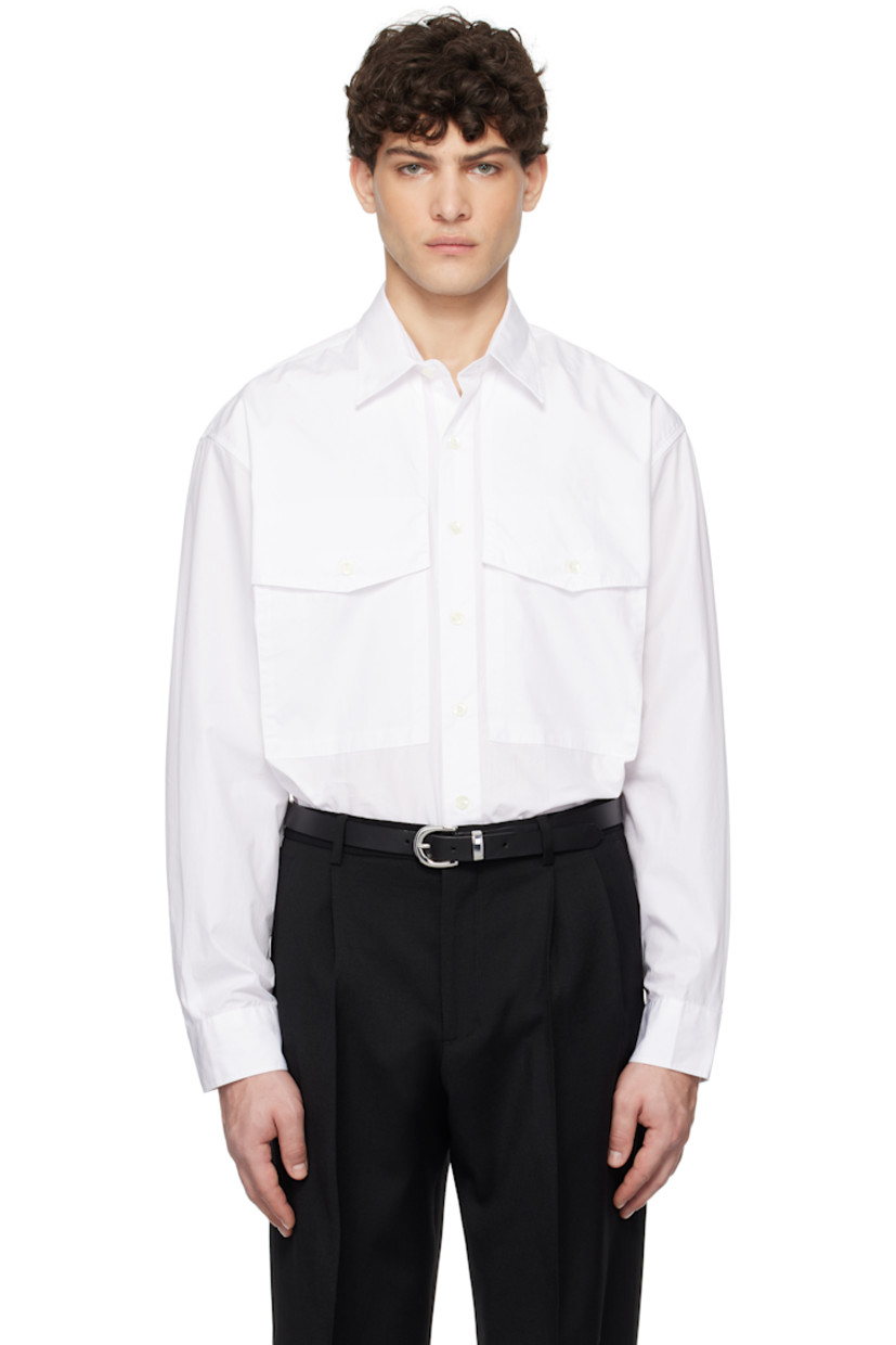 120's cotton poplin shirt. 

· Spread collar
· Button closure
· Flap pockets
· Shirttail hem
· Pleats at adjustable single-button barrel cuffs
· Mother-of-pearl hardware

Supplier color: White