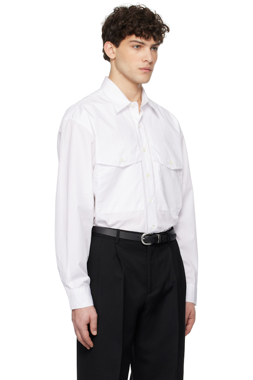 120's cotton poplin shirt. 

· Spread collar
· Button closure
· Flap pockets
· Shirttail hem
· Pleats at adjustable single-button barrel cuffs
· Mother-of-pearl hardware

Supplier color: White