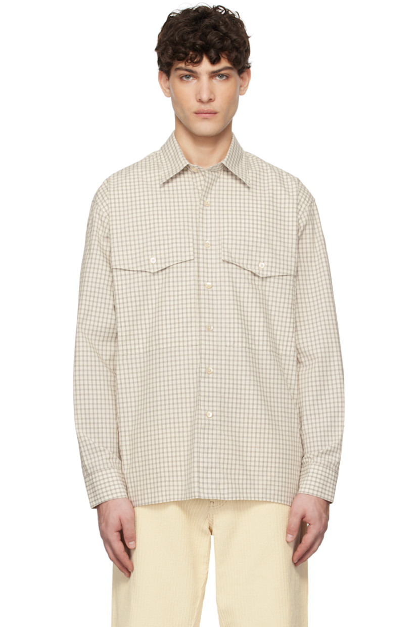 Cotton poplin shirt. Check pattern throughout.

· Spread collar
· Button closure
· Flap pockets
· Shirttail hem
· Pleats at adjustable single-button barrel cuffs
· Mother-of-pearl hardware

Supplier color: Off white