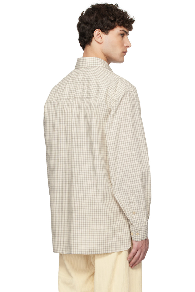 Cotton poplin shirt. Check pattern throughout.

· Spread collar
· Button closure
· Flap pockets
· Shirttail hem
· Pleats at adjustable single-button barrel cuffs
· Mother-of-pearl hardware

Supplier color: Off white