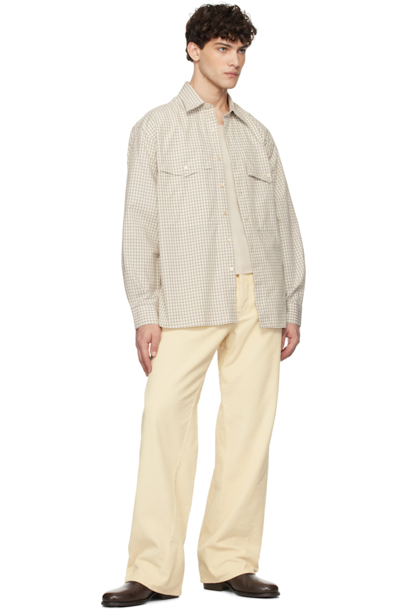 Cotton poplin shirt. Check pattern throughout.

· Spread collar
· Button closure
· Flap pockets
· Shirttail hem
· Pleats at adjustable single-button barrel cuffs
· Mother-of-pearl hardware

Supplier color: Off white