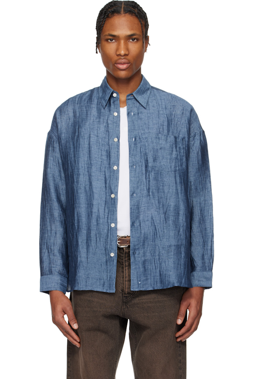 Crinkled linen-blend gauze shirt. 

· Spread collar
· Button closure
· Patch pocket at chest
· Shirttail hem
· Dropped shoulders
· Single-button barrel cuffs
· Mother-of-pearl hardware

Supplier color: Blue