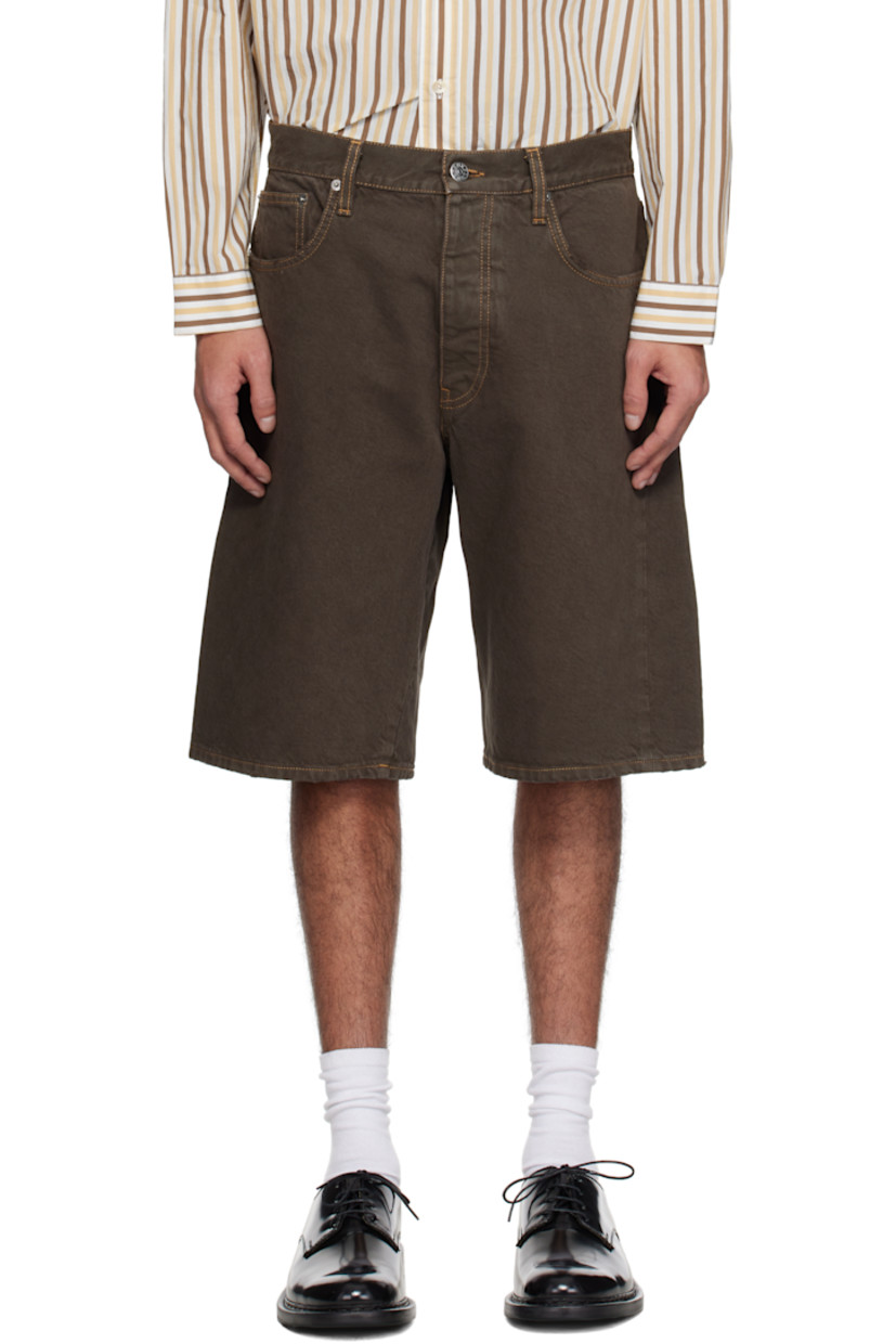Wide-leg organic cotton twill shorts. Subtle hand-distressing throughout.

· Garment-dyed
· Belt loops
· Five-pocket styling
· Button fly
· Twisted outseams
· Leather logo patch at back waistband
· Logo-engraved silver-tone hardware
· Contrast stitching in tan

Supplier color: Vintage brown