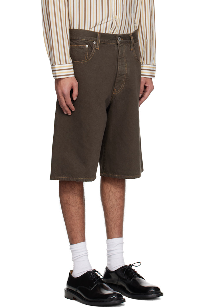 Wide-leg organic cotton twill shorts. Subtle hand-distressing throughout.

· Garment-dyed
· Belt loops
· Five-pocket styling
· Button fly
· Twisted outseams
· Leather logo patch at back waistband
· Logo-engraved silver-tone hardware
· Contrast stitching in tan

Supplier color: Vintage brown