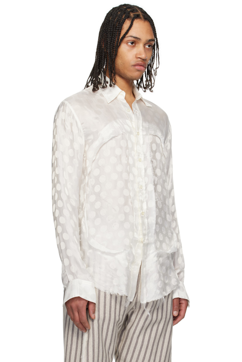 Bemberg cupro damask shirt. Jacquard polka dot pattern throughout. 

· Spread collar
· Button closure
· Inset panels with frayed edge at front
· Frayed edge at shirttail hem
· Buttoned barrel cuffs

Supplier color: White