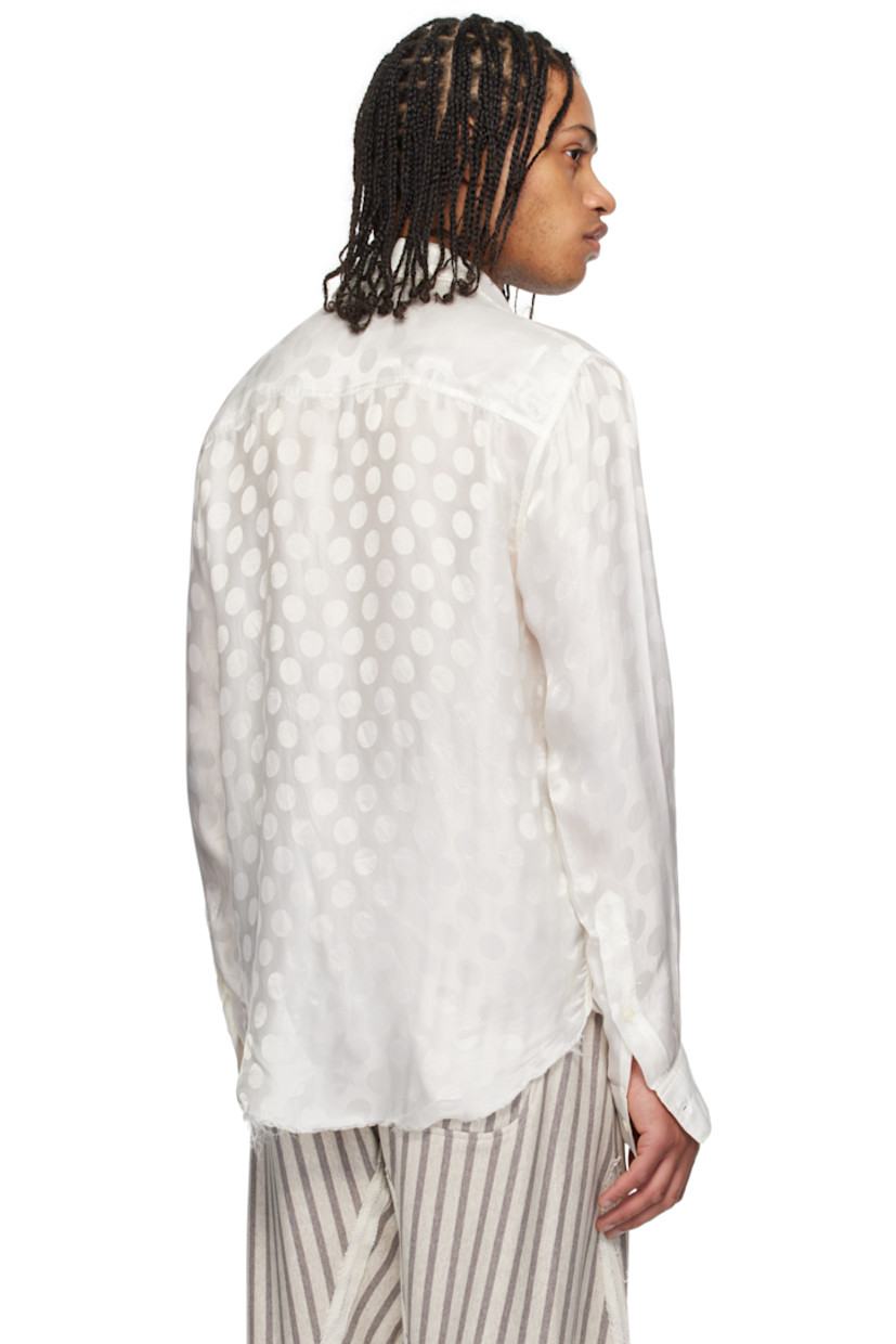 Bemberg cupro damask shirt. Jacquard polka dot pattern throughout. 

· Spread collar
· Button closure
· Inset panels with frayed edge at front
· Frayed edge at shirttail hem
· Buttoned barrel cuffs

Supplier color: White
