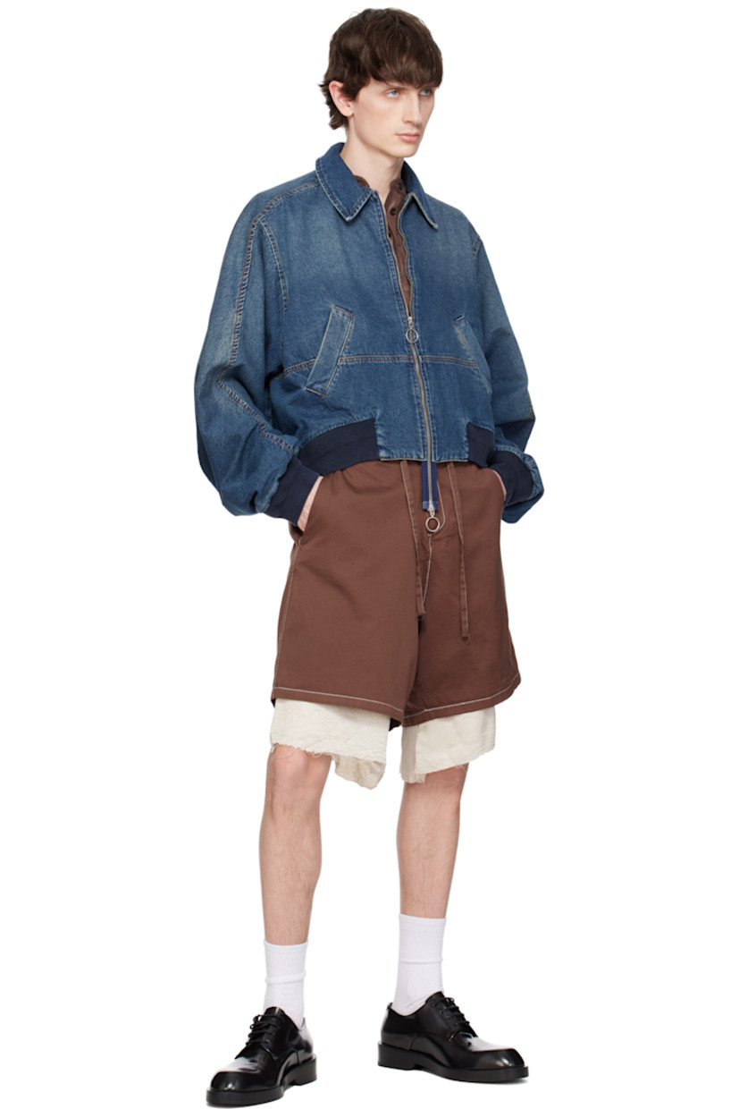 Piece-dyed cotton drill shorts. 

· Drawstring at waistband
· Four-pocket styling
· Zip fly
· Exposed crinkled satin lining with raw edge at cuffs
· Contrast stitching in off-white

Supplier color: Washed brown/Cream