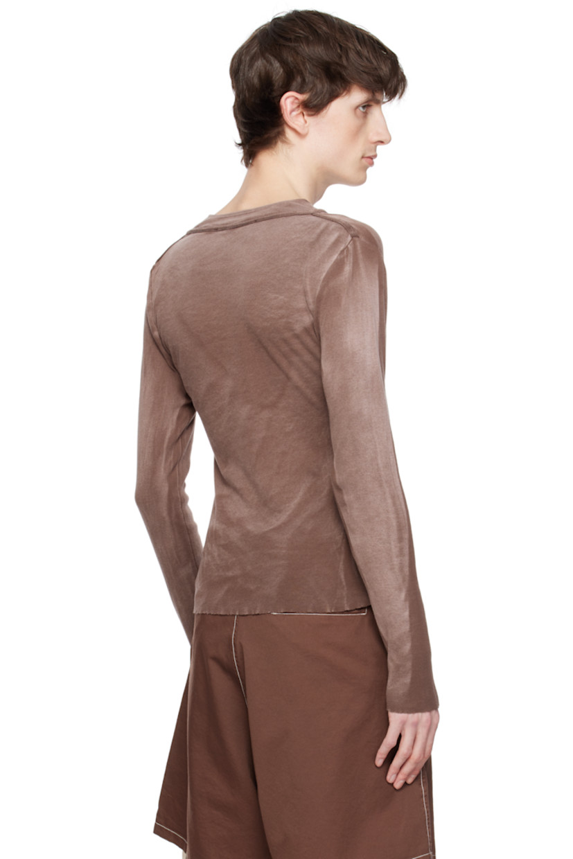 Piece-dyed cotton jersey henley. Fading and grosgrain trim throughout. 

· Crewneck
· Four-button placket
· Raw edge at hem and cuffs

Supplier color: Washed brown