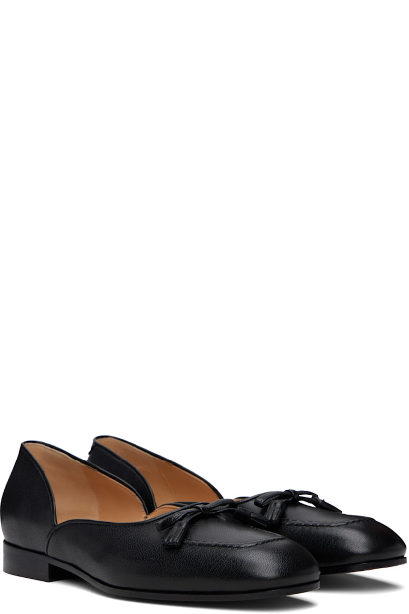 Grained calfskin loafers in black.

· Square moc toe
· Bow accent at vamp
· Logo hardware at heel 
· Stacked leather heel with rubber injection
· Leather sole 
· Gold-tone hardware

Supplier color: Nero