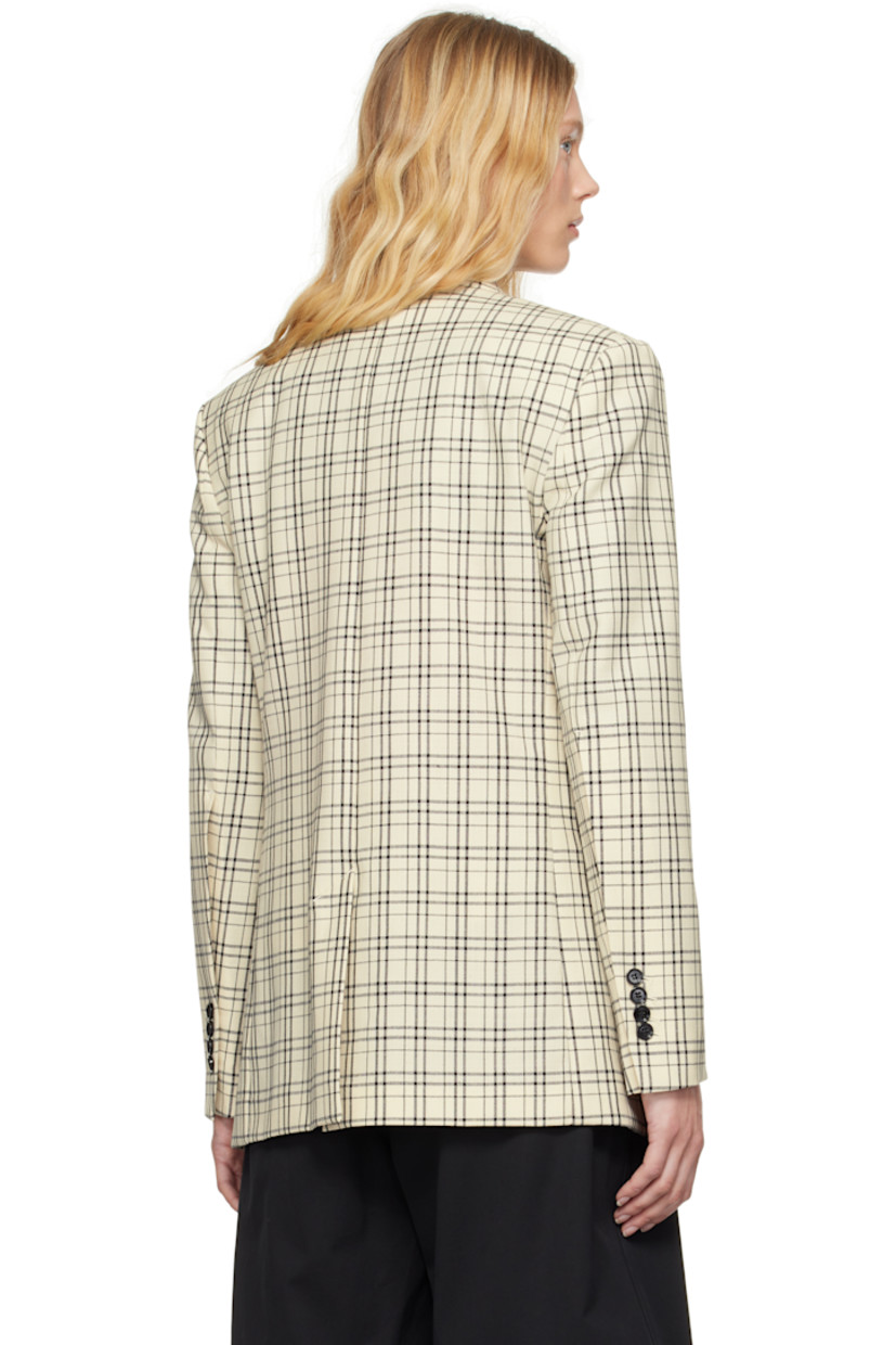 Virgin wool canvas blazer. Check pattern and darts throughout.

· Notched lapel
· Button closure
· Welt pockets
· Padded shoulders
· Four-button surgeon's cuffs
· Central vent at back hem
· Welt pockets at interior
· Partial twill and satin lining

Supplier color: White cream/Black