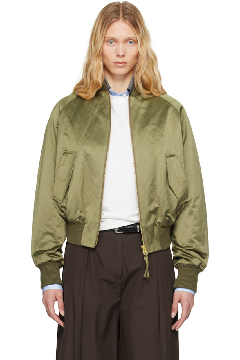 Padded cotton- and polyester-blend satin bomber jacket.

· Rib-knit stand collar, hem, and cuffs
· Two-way zip closure
· Logo embossed at chest
· Flap pockets
· Raglan sleeves
· Welt pocket at interior
· Full twill lining

Supplier color: Loden