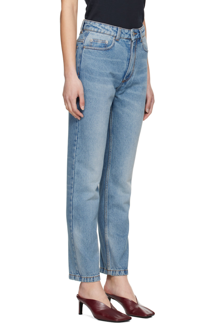 Non-stretch denim jeans. Fading and whiskering throughout.

· Belt loops
· Five-pocket styling
· Button fly
· Jacron logo patch at back waist
· Logo-engraved silver-tone hardware
· Contrast stitching in tan

Supplier color: Used blue
