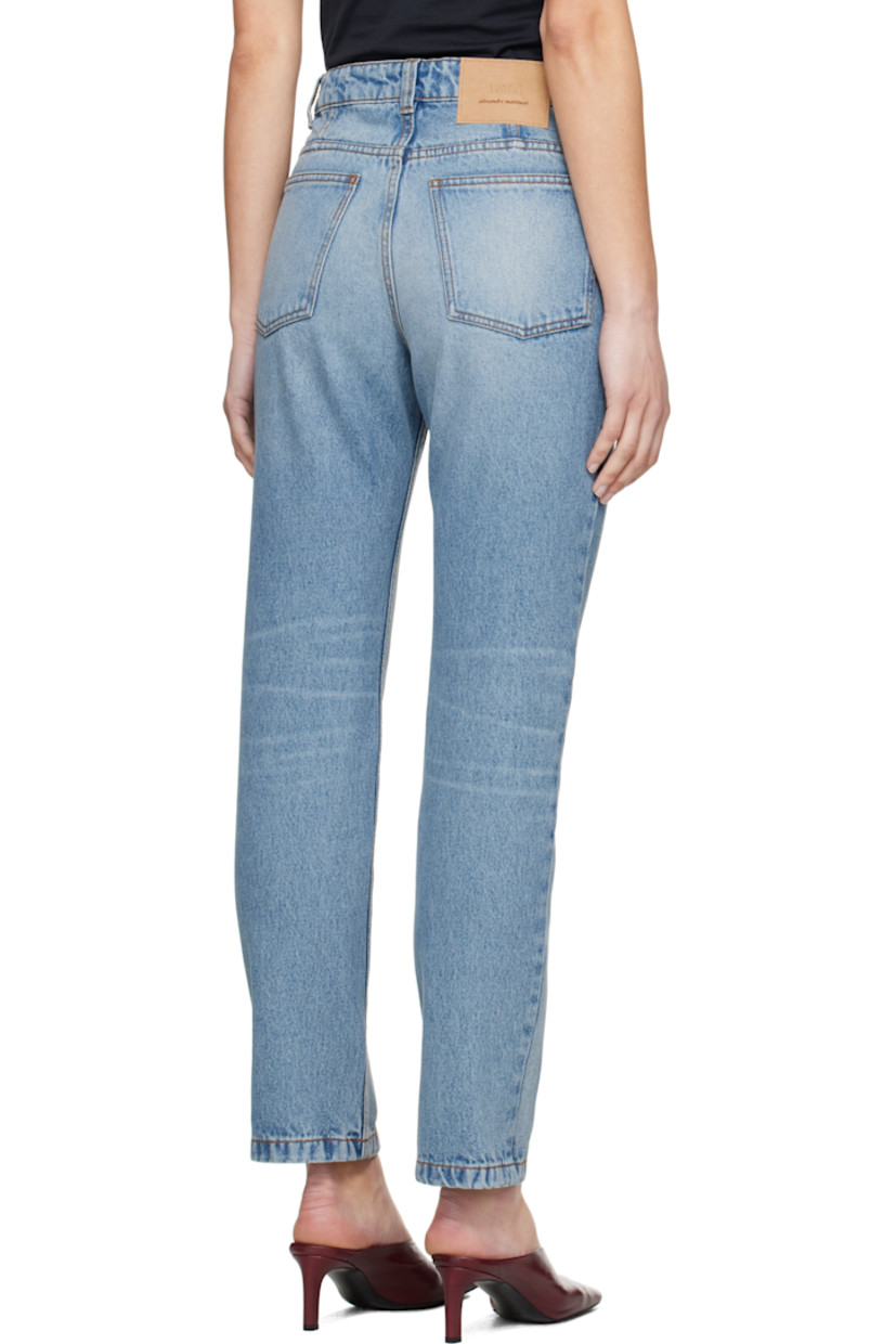 Non-stretch denim jeans. Fading and whiskering throughout.

· Belt loops
· Five-pocket styling
· Button fly
· Jacron logo patch at back waist
· Logo-engraved silver-tone hardware
· Contrast stitching in tan

Supplier color: Used blue