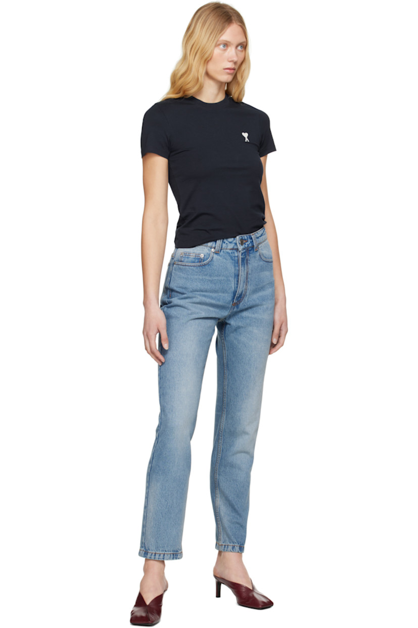 Non-stretch denim jeans. Fading and whiskering throughout.

· Belt loops
· Five-pocket styling
· Button fly
· Jacron logo patch at back waist
· Logo-engraved silver-tone hardware
· Contrast stitching in tan

Supplier color: Used blue