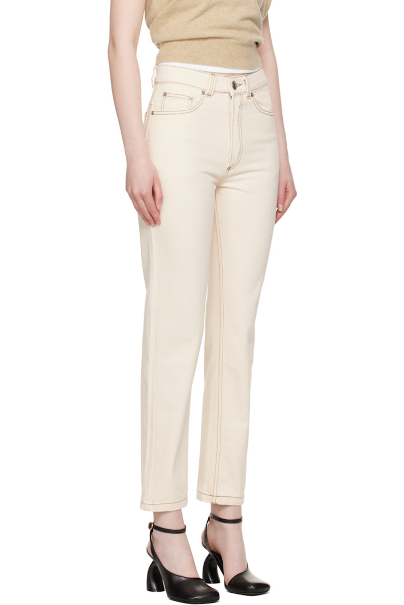 Non-stretch denim jeans.

· Belt loops
· Five-pocket styling
· Zip fly
· Logo patch at back waistband
· Contrast stitching in tan

Supplier color: White cream