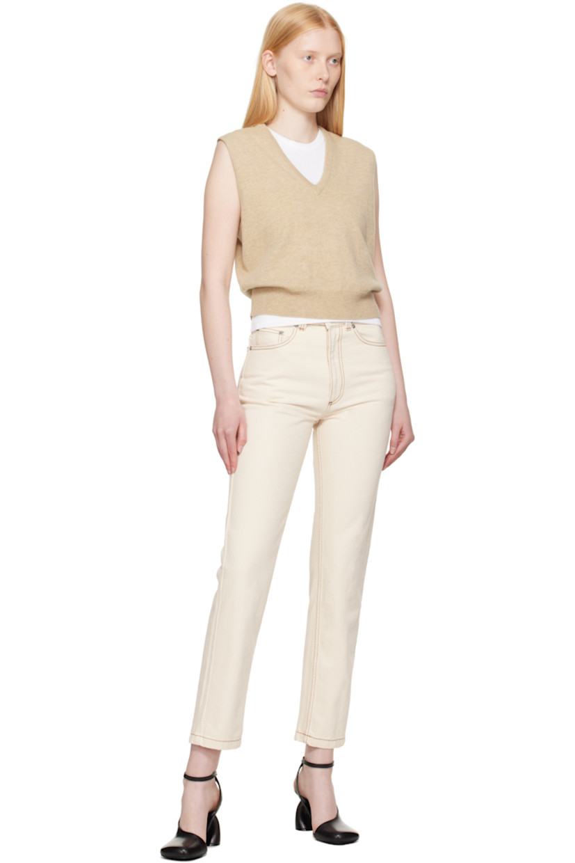 Non-stretch denim jeans.

· Belt loops
· Five-pocket styling
· Zip fly
· Logo patch at back waistband
· Contrast stitching in tan

Supplier color: White cream