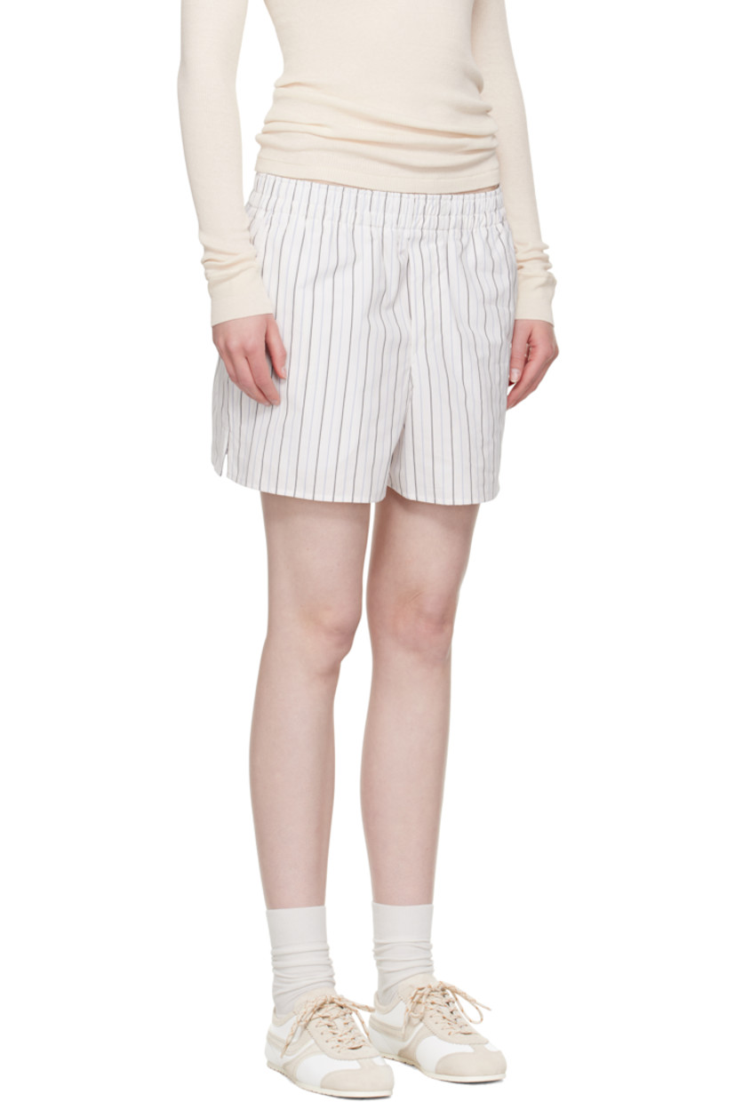Cotton poplin shorts. Pinstripes throughout.

· Elasticized waistband
· Three-pocket styling
· Mock fly
· Vented cuffs
· Logo patch at back pocket

Supplier color: Offwhite/Blue note/Navy blue