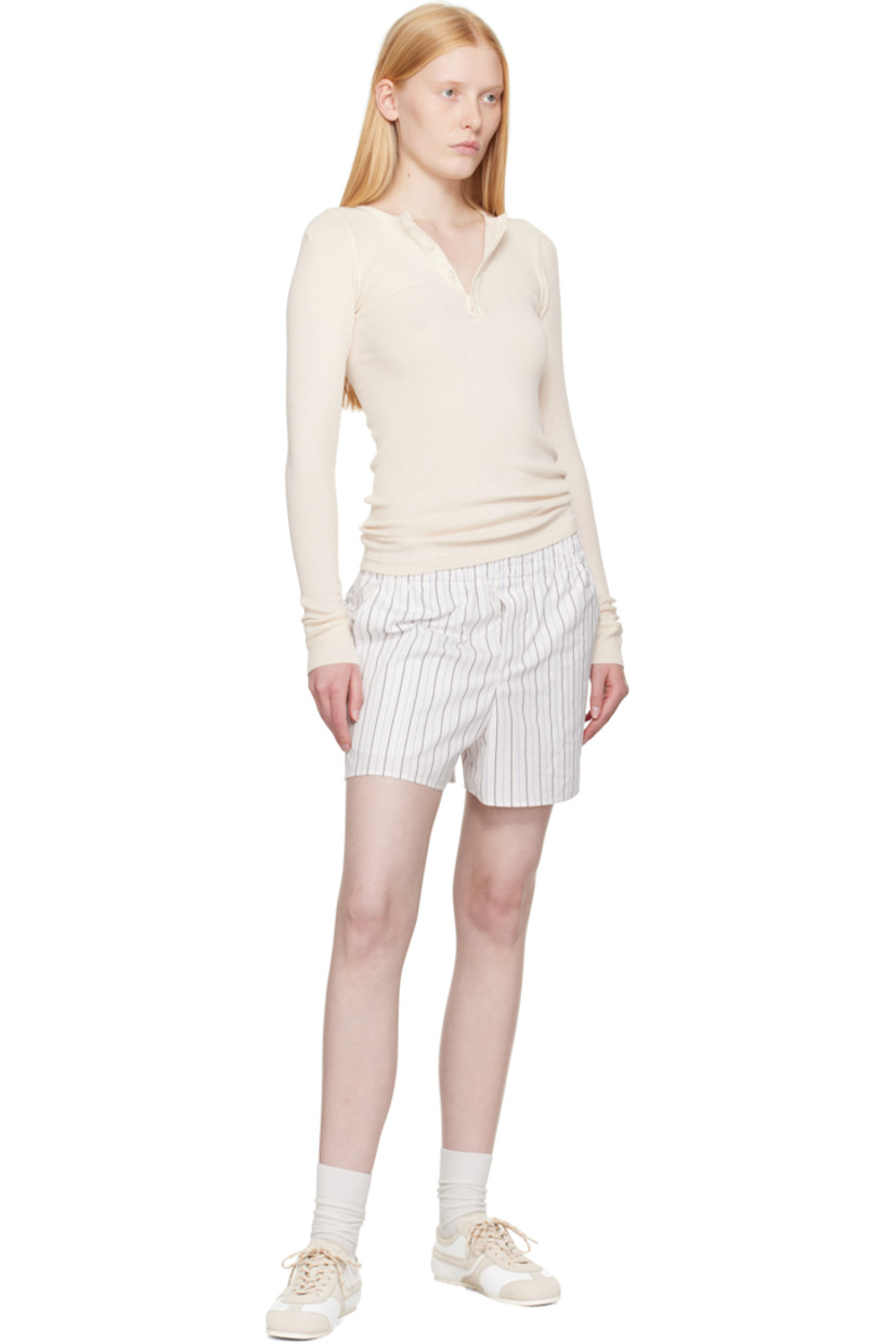 Cotton poplin shorts. Pinstripes throughout.

· Elasticized waistband
· Three-pocket styling
· Mock fly
· Vented cuffs
· Logo patch at back pocket

Supplier color: Offwhite/Blue note/Navy blue