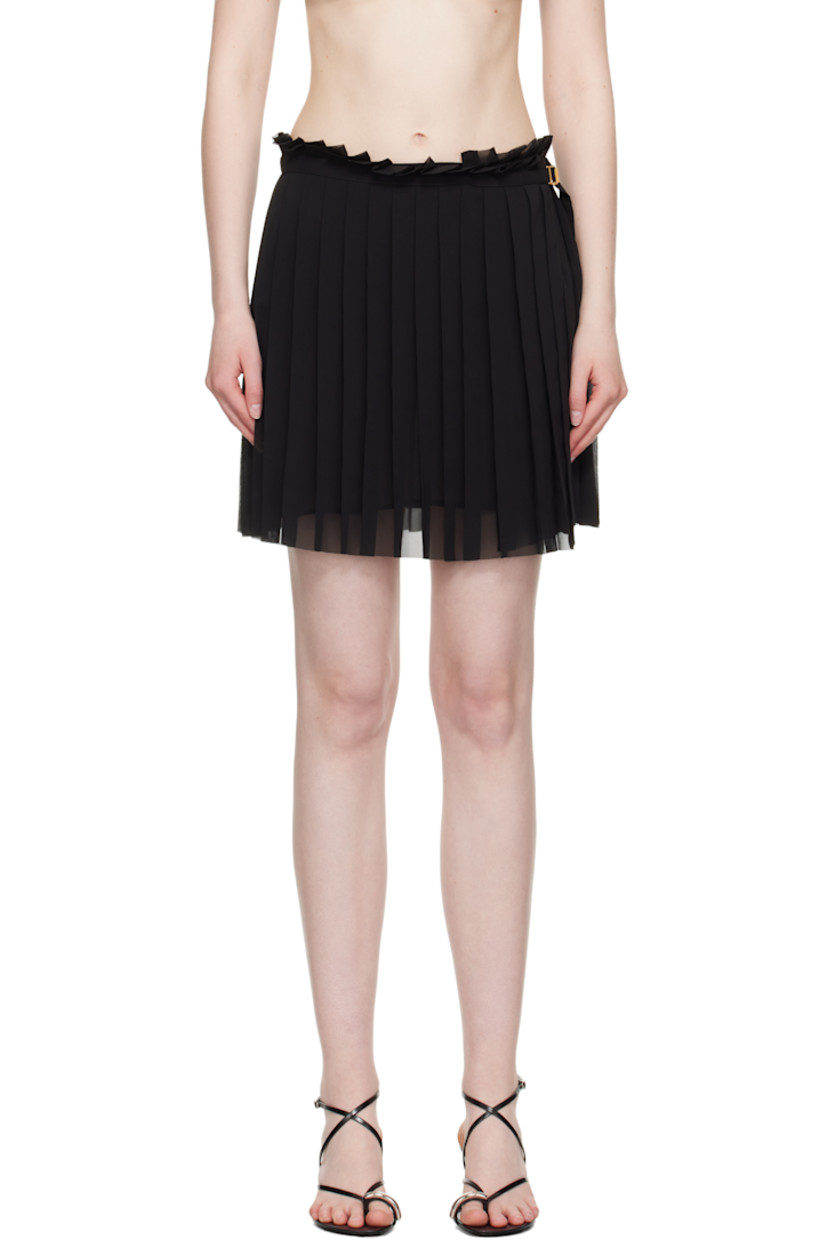 Polyester crêpe miniskirt. Knife pleats throughout.

· Raw edge at elasticized waistband and hem
· Cinch strap and adjustable button fastening at side seam
· Fully lined

Supplier color: Black