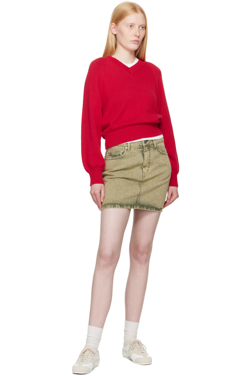 Non-stretch denim miniskirt. Fading throughout.

· High-rise
· Belt loops
· Five-pocket styling
· Zip fly
· Logo patch at back waistband

Supplier color: Laurel
