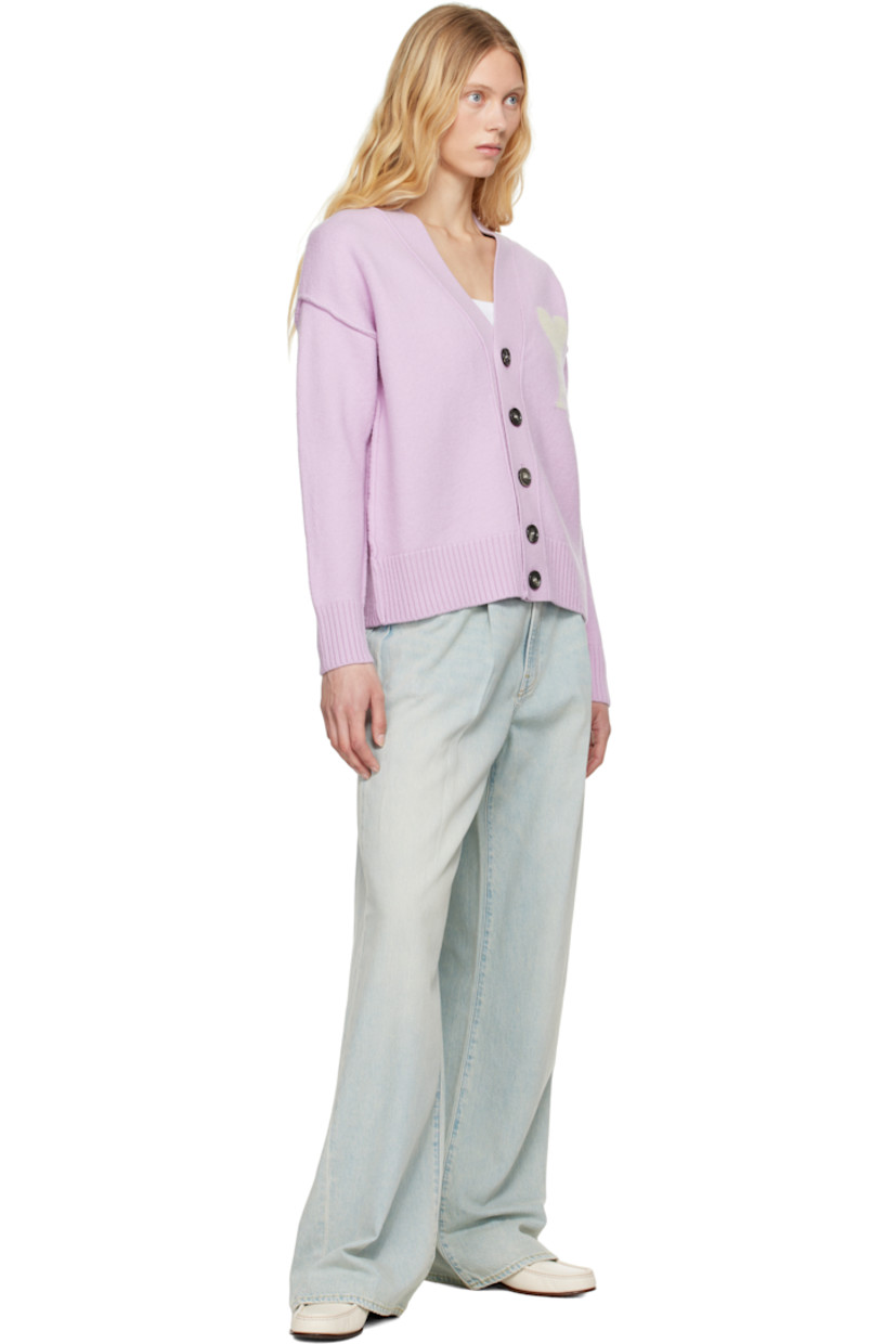 Felted knit virgin wool cardigan. Inverted seams throughout.

· Rib-knit Y-neck, placket, hem, and cuffs
· Button closure
· Intarsia logo at chest
· Dropped shoulders

Supplier color: Lilac/Off white