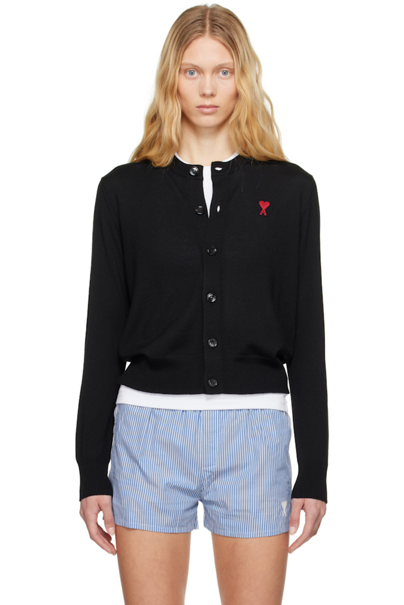 Knit merino wool cardigan.

· Rib-knit crewneck, placket, hem, and cuffs
· Button closure
· Logo embroidered at chest
· Horn hardware

Supplier color: Black