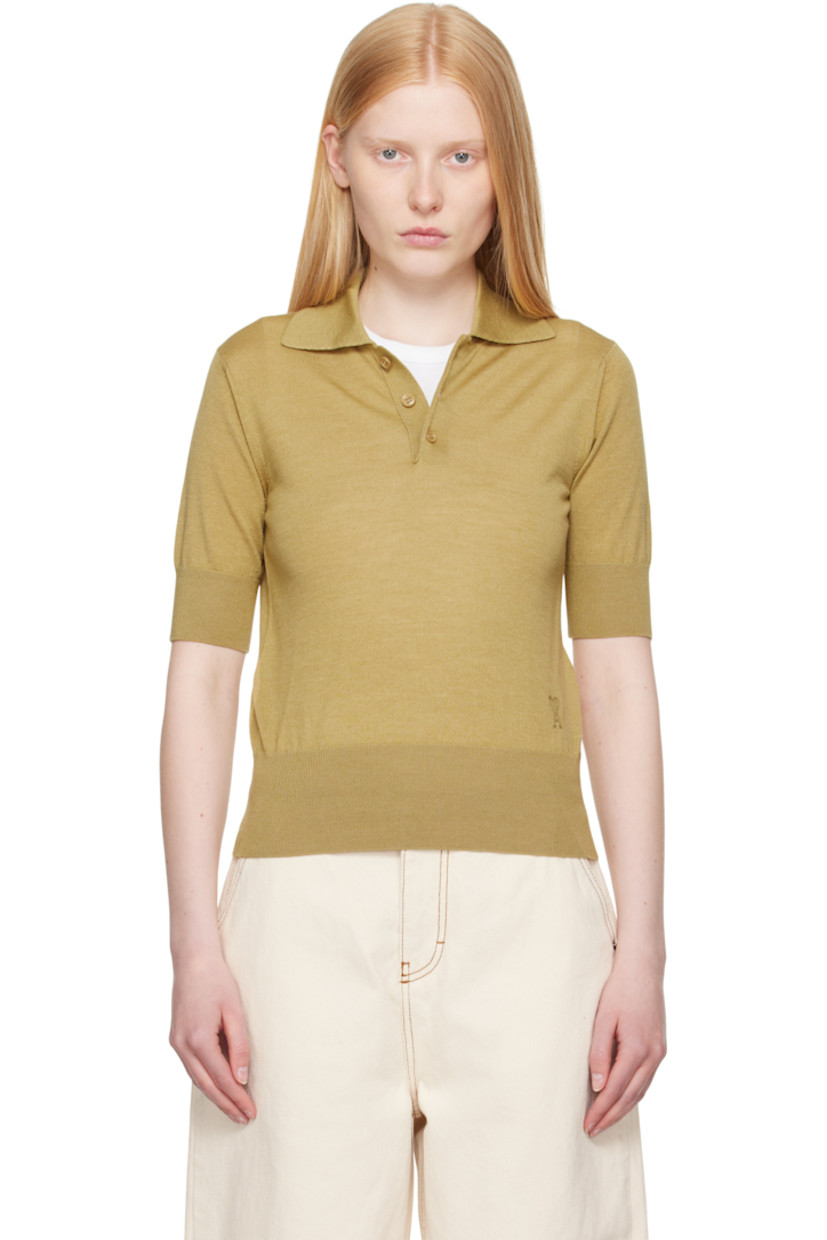 Knit extrafine merino wool- and silk-blend polo.

· Rib-knit spread collar, hem, and cuffs
· Three-button placket
· Logo embroidered at front

Supplier color: Havana
