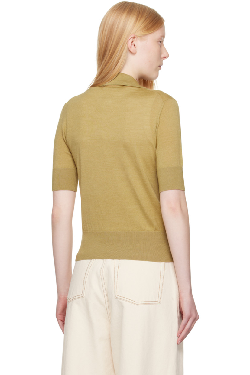 Knit extrafine merino wool- and silk-blend polo.

· Rib-knit spread collar, hem, and cuffs
· Three-button placket
· Logo embroidered at front

Supplier color: Havana