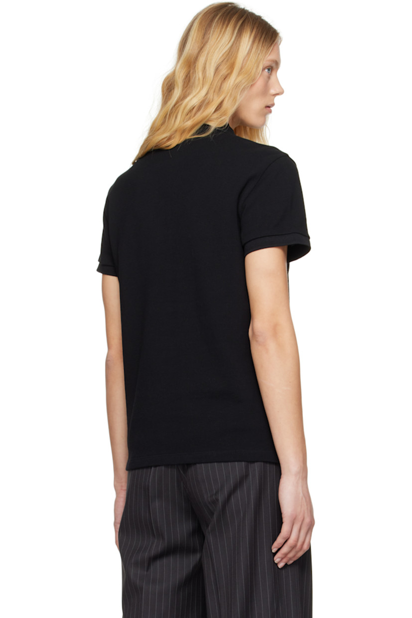 Organic cotton piqué polo.

· Rib-knit spread collar and cuffs
· Two-button placket
· Logo embroidered at chest and back collar
· Vented side seams

Supplier color: Black