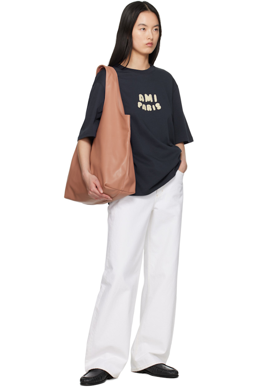 Boxy-fit organic cotton jersey T-shirt.

· Rib-knit crewneck
· Embroidered logo appliqués at chest
· Logo embroidered at back collar

Supplier color: Navy blue
