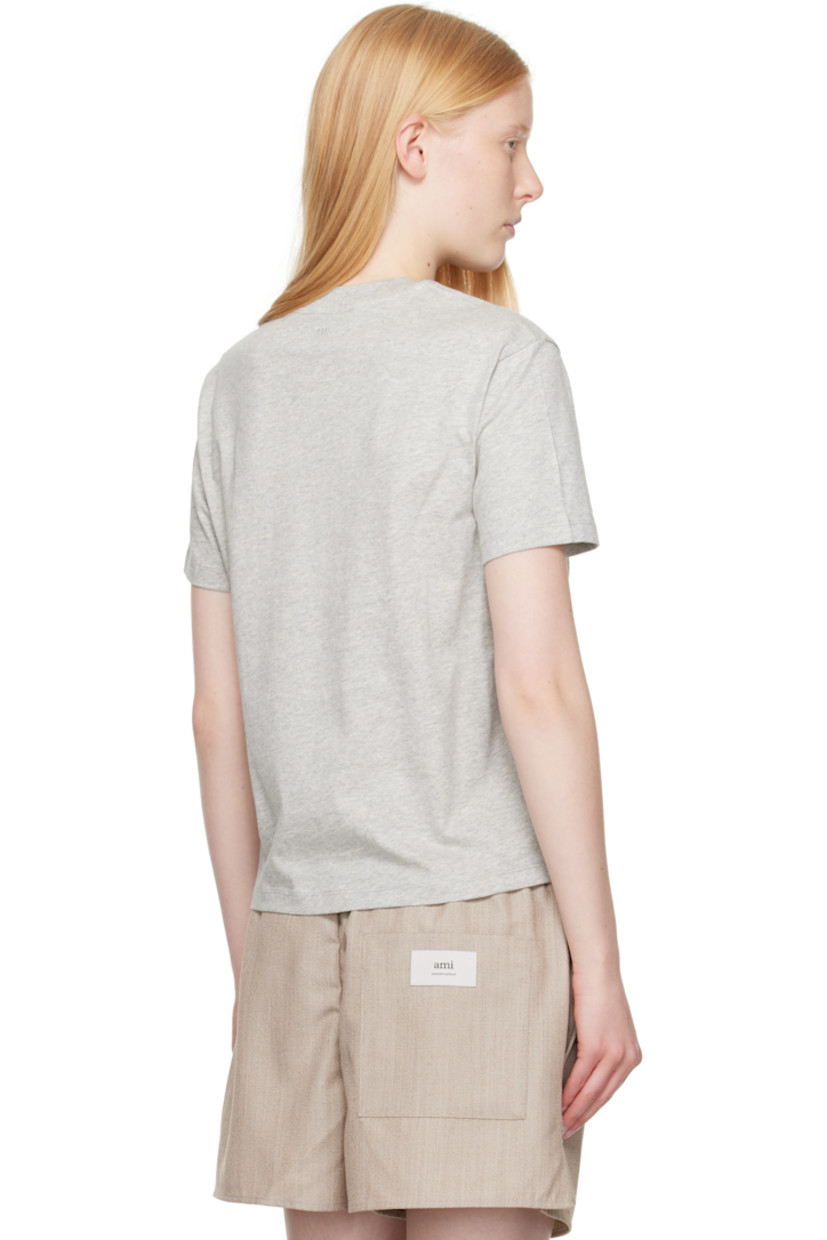Organic cotton jersey T-shirt.

· Rib-knit crewneck
· Logo embroidered at chest and back collar 

Supplier color: Heather ash grey