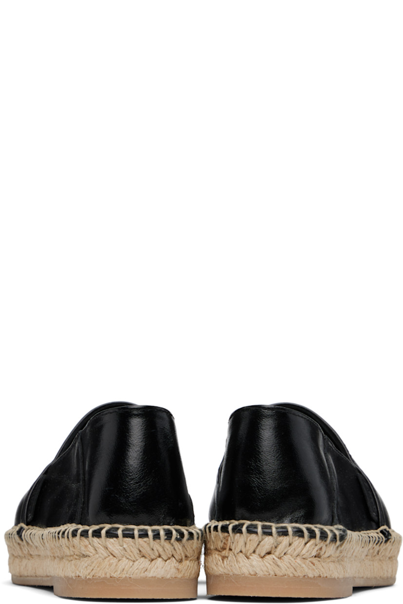 Crackled polished leather espadrilles in black. 

· Logo flag at outer side
· Unlined
· Blanket stitching at welt
· Braided jute midsole
· Treaded crêpe rubber sole 

Supplier color: Noir