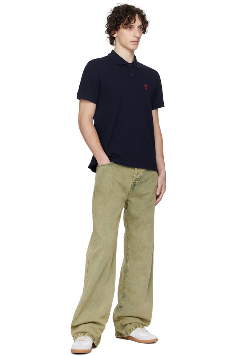 Loose-fit non-stretch denim jeans. Fading throughout

· Belt loops
· Five-pocket styling
· Button fly
· Logo patch at back waistband
· Logo-engraved silver-tone hardware

Supplier color: Laurel