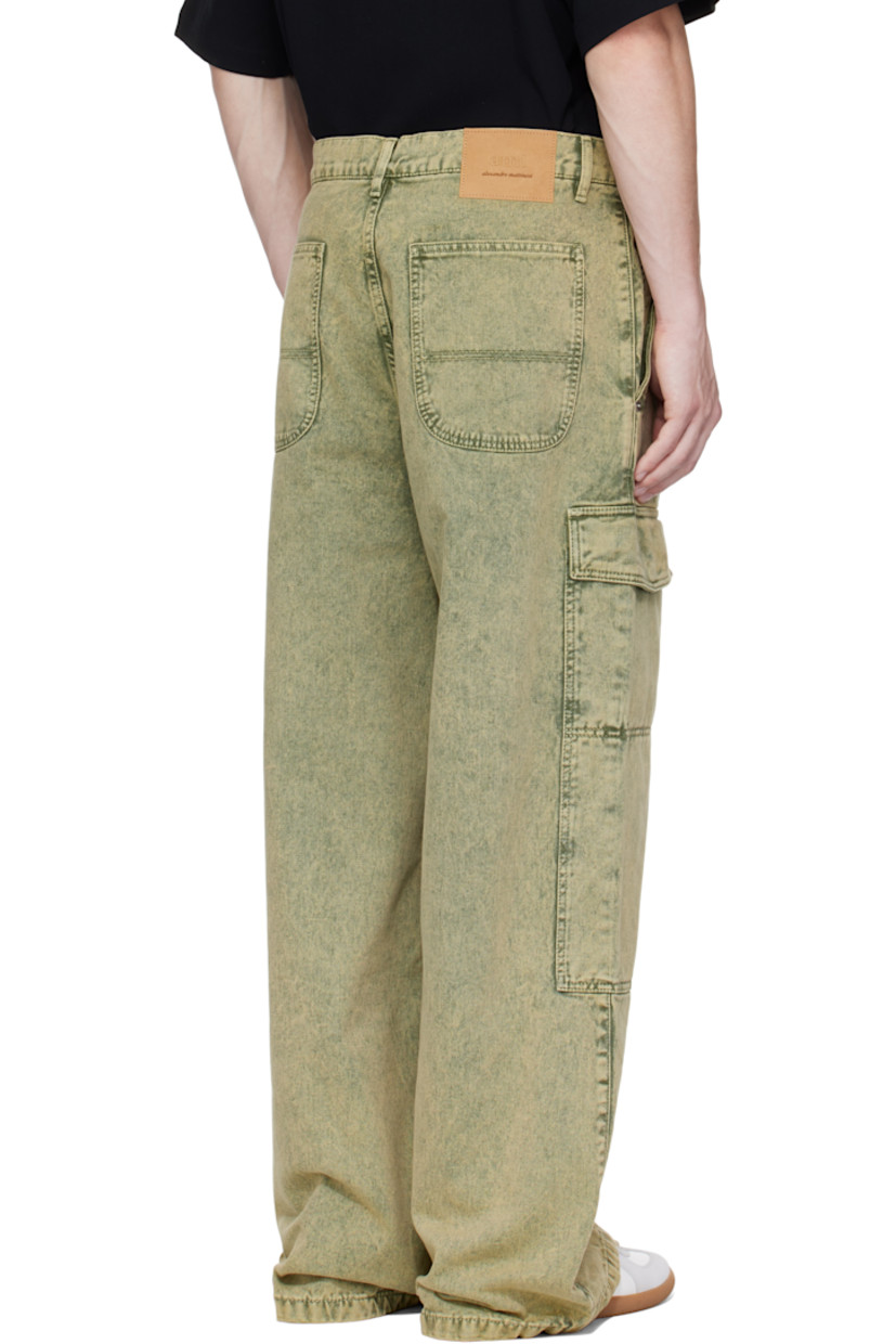 Wide-leg non-stretch denim cargo pants. Fading throughout.

· Belt loops
· Five-pocket styling
· Button fly
· Flap pocket at outseams
· Logo patch at back waistband
· Logo-engraved silver-tone hardware

Supplier color: Laurel