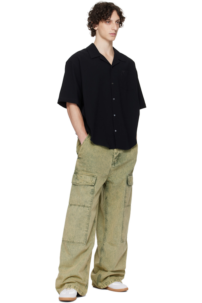 Wide-leg non-stretch denim cargo pants. Fading throughout.

· Belt loops
· Five-pocket styling
· Button fly
· Flap pocket at outseams
· Logo patch at back waistband
· Logo-engraved silver-tone hardware

Supplier color: Laurel