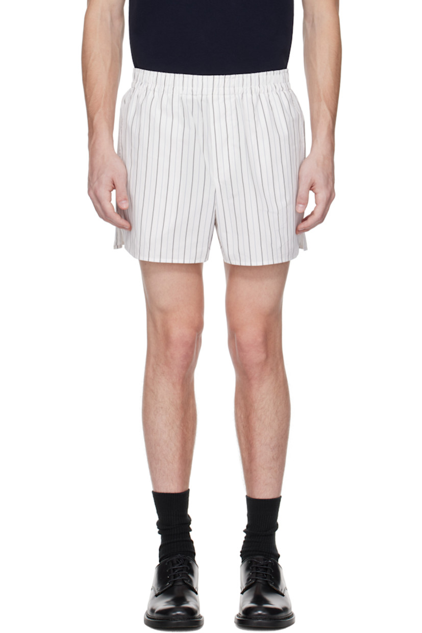 Cotton poplin shorts. Striped throughout.

· Elasticized waistband
�· Three-pocket styling
· Mock fly
· Logo patch at back pocket

Supplier color: Off-white/Blue