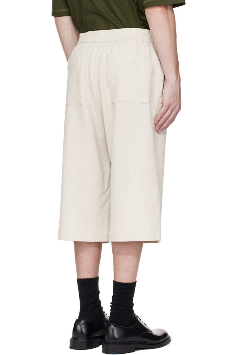 Cotton twill shorts.

· Cinch tab at elasticized waistband
· Four-pocket styling
· Mock fly
· Logo hardware at back pocket
· Logo-engraved silver-tone hardware

Supplier color: Mastic