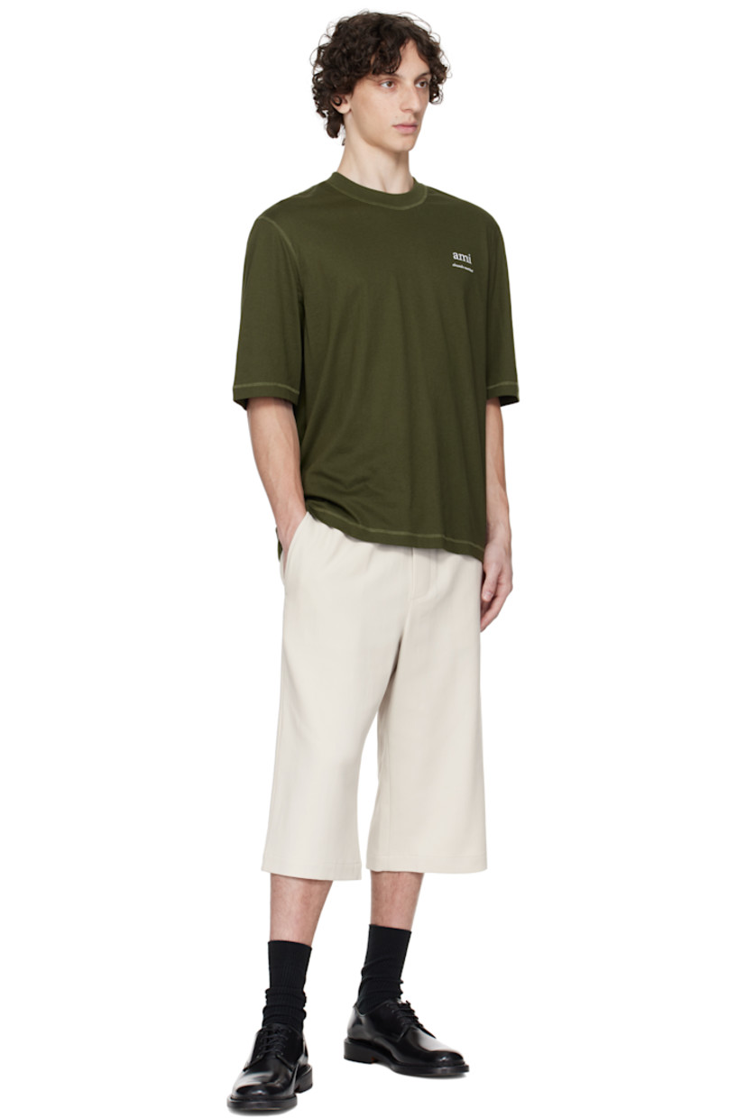 Cotton twill shorts.

· Cinch tab at elasticized waistband
· Four-pocket styling
· Mock fly
· Logo hardware at back pocket
· Logo-engraved silver-tone hardware

Supplier color: Mastic