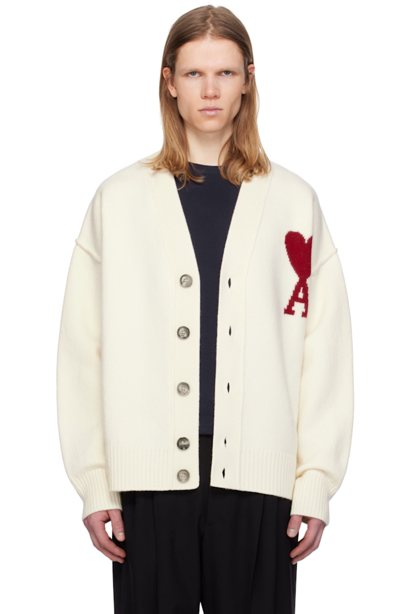 Felted knit virgin wool cardigan. Inverted seams throughout.

· Rib-knit Y-neck, hem, and cuffs
· Button closure
· Intarsia logo at chest
· Dropped shoulders

Supplier color: Off white/Red