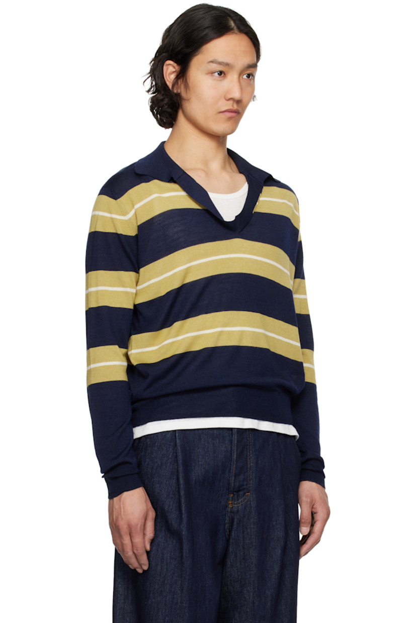 Knit extrafine merino wool- and silk-blend polo. Intarsia stripes throughout.

· Rib-knit open spread collar, hem, and cuffs
· Logo embroidered at front hem 

Supplier color: Navy/Havana/White
