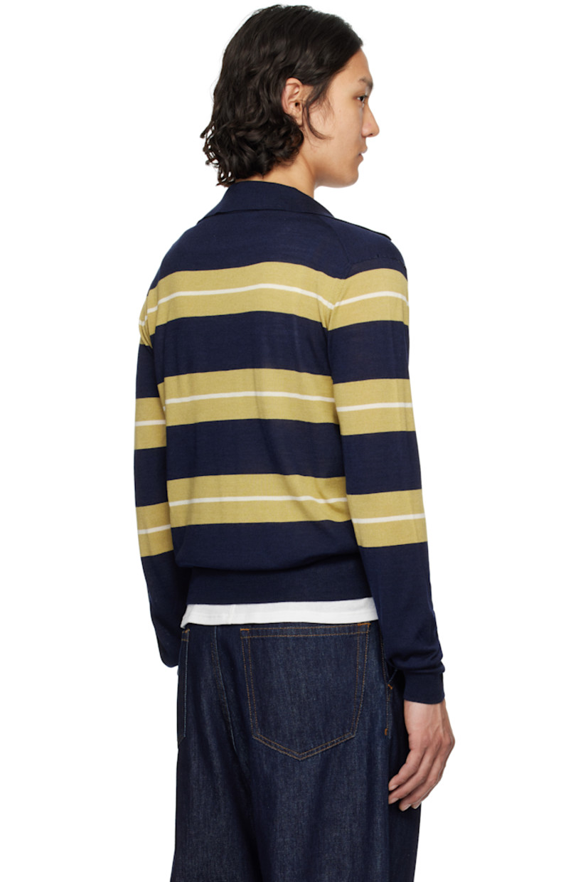 Knit extrafine merino wool- and silk-blend polo. Intarsia stripes throughout.

· Rib-knit open spread collar, hem, and cuffs
· Logo embroidered at front hem 

Supplier color: Navy/Havana/White