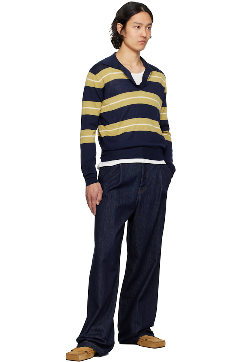 Knit extrafine merino wool- and silk-blend polo. Intarsia stripes throughout.

· Rib-knit open spread collar, hem, and cuffs
· Logo embroidered at front hem 

Supplier color: Navy/Havana/White