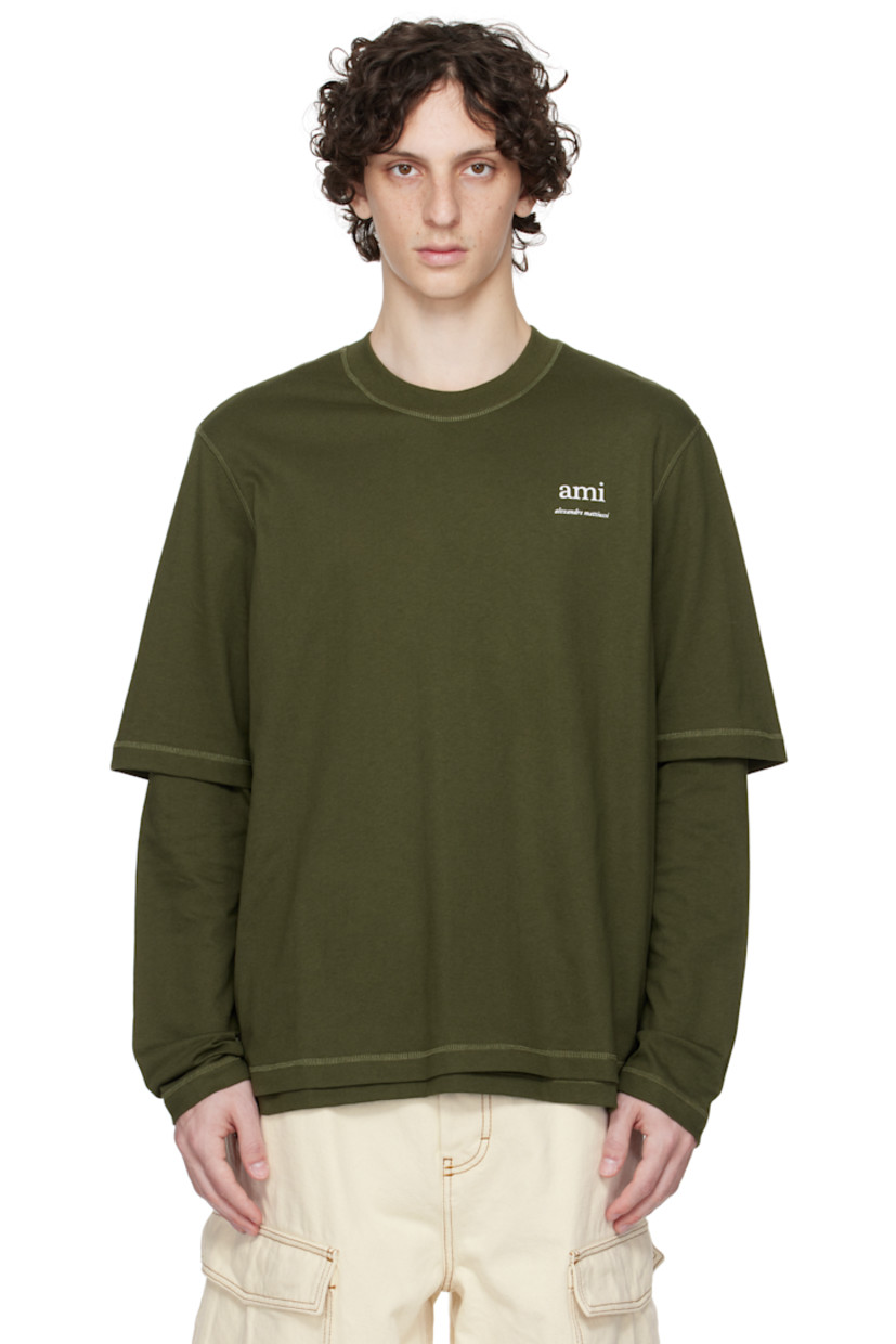 Organic cotton jersey T-shirt.

· Layered sleeves
· Rib-knit crewneck
· Logo bonded at chest
· Logo embroidered at back collar

Supplier color: Loden