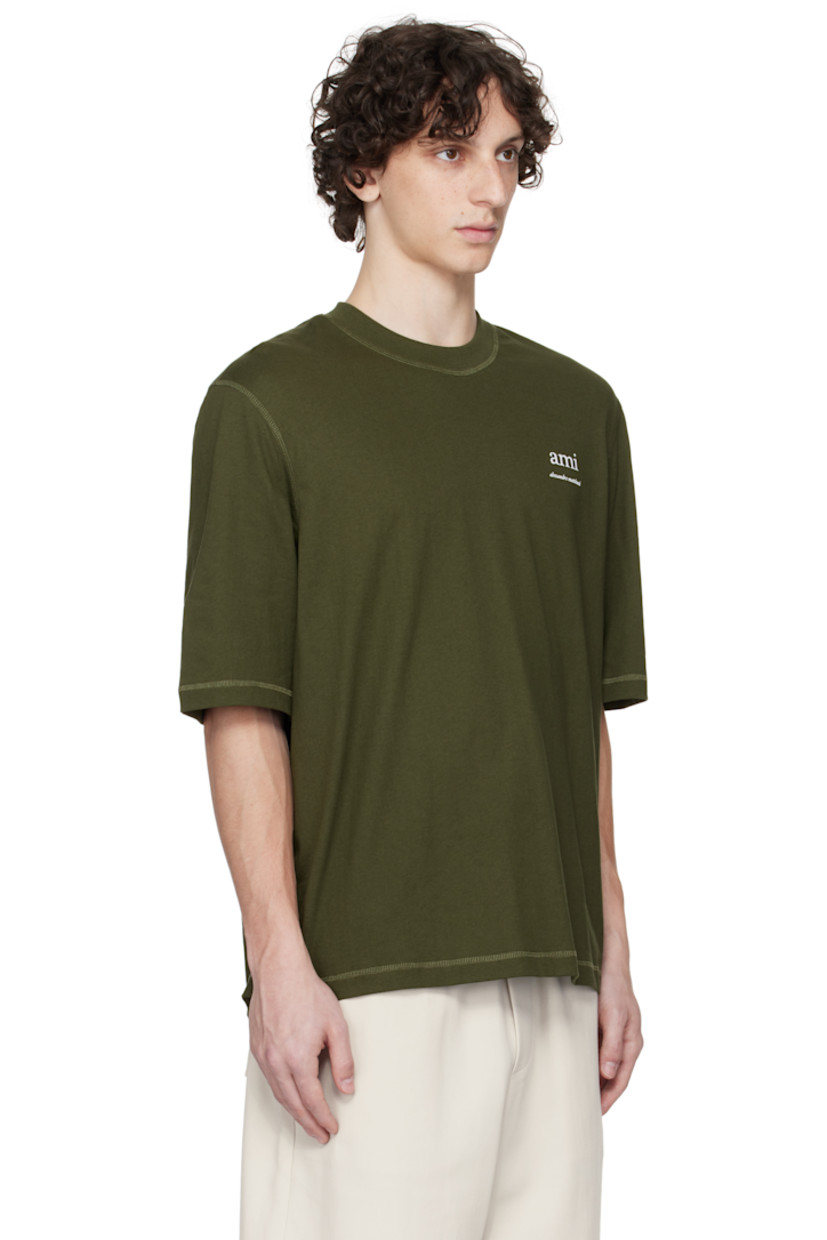 Organic cotton jersey T-shirt.

· Rib-knit crewneck
· Logo bonded at chest
· Logo embroidered at back collar

Supplier color: Loden